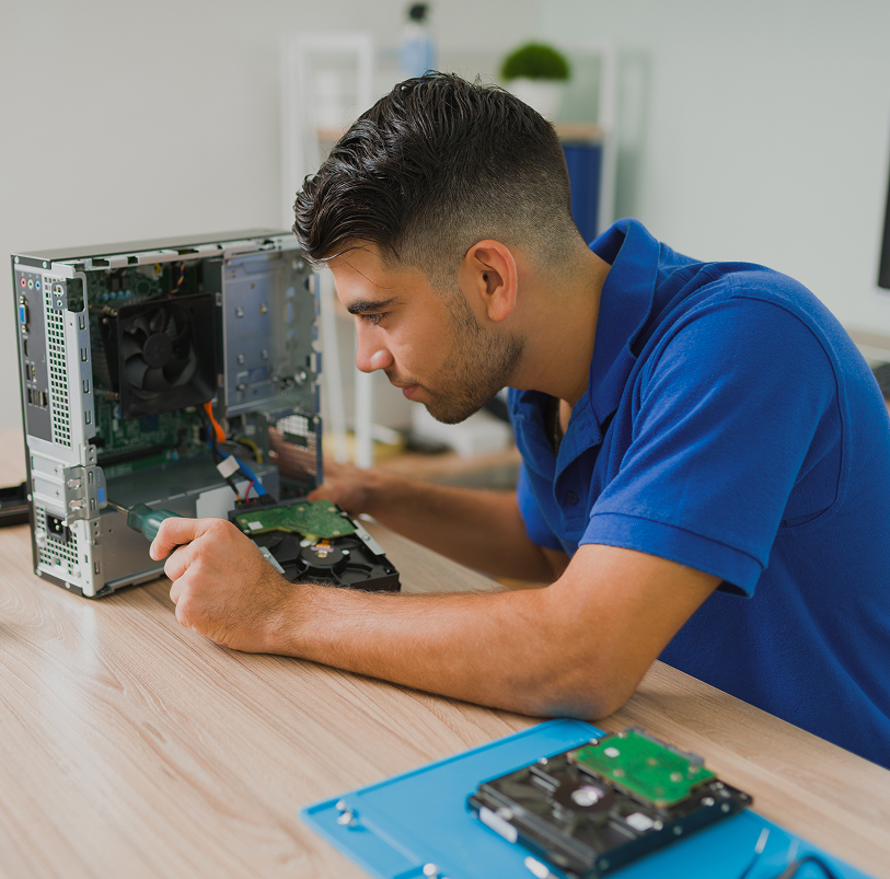 i-need-fix-this-young-man-using-screwdriver-look-inside-broken-cpu-computer-before-repairing-shop 1