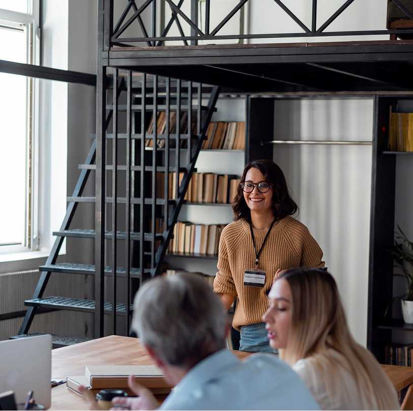 medium-shot-people-discussing-business 1